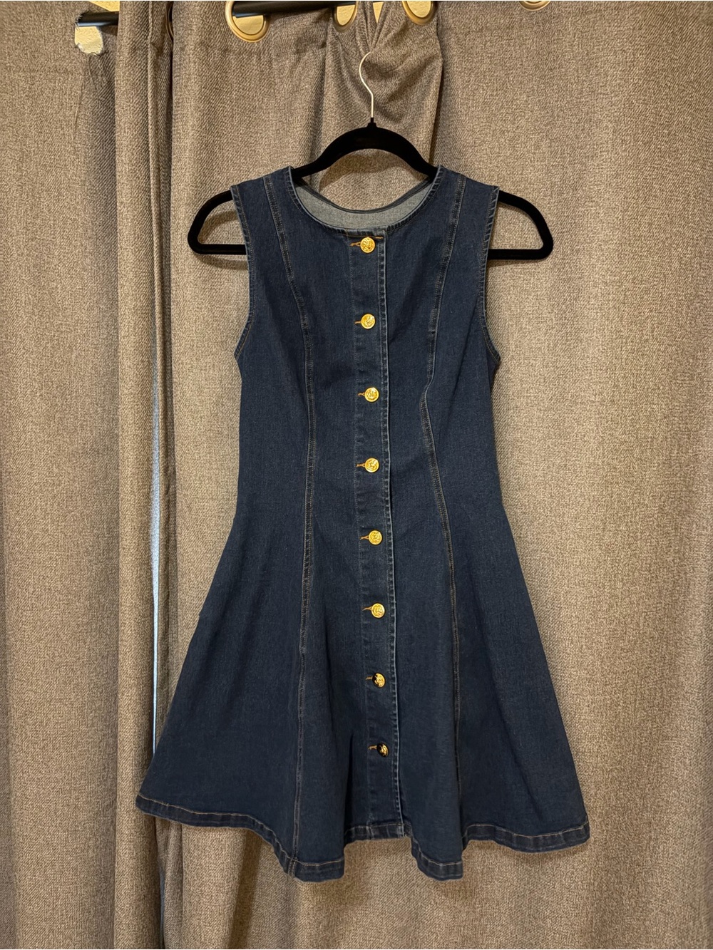 Denim dress with flower buttons